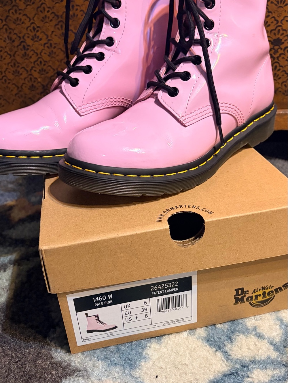 Dr. Martens Pale Pink Patent Leather Lace-Up Boots with Yellow Stitching